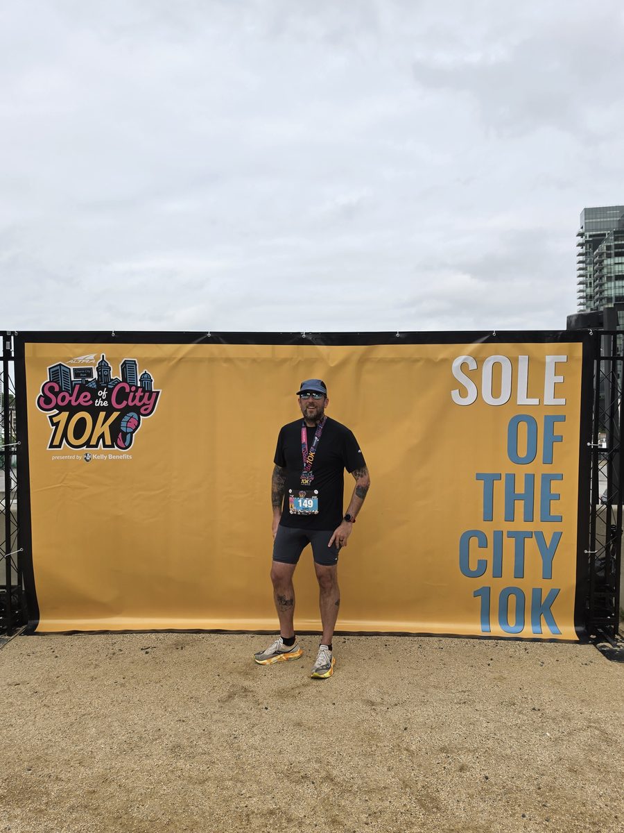 Scott — founder of RunSignal, pictured at the Sole of the City 10K